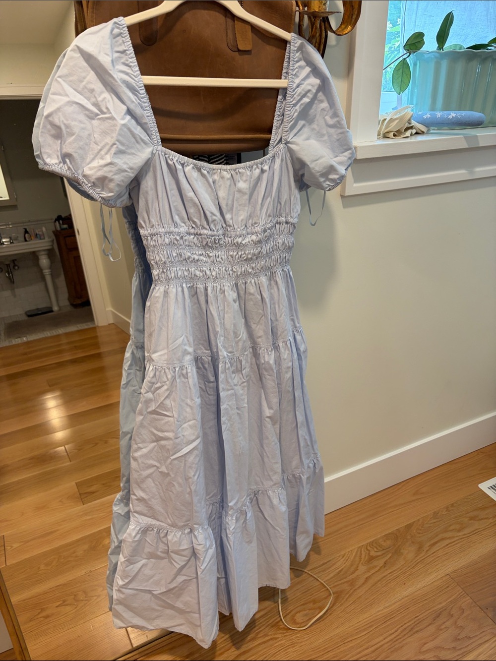 Light Blue Puff-Sleeve Smocked Midi Dress. aritzia
